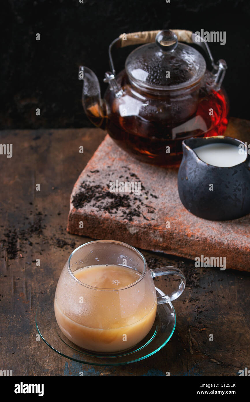 Cup of black tea with milk Stock Photo Alamy