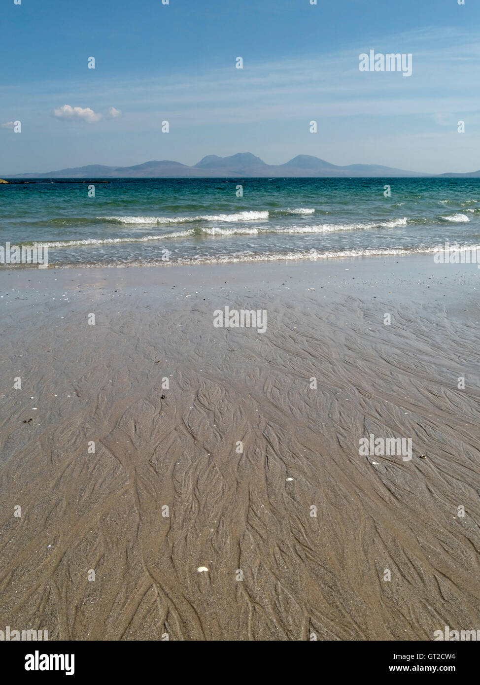 The Isle of Jura seen from sandy beach at The Strand on the Hebridean Island of Colonsay, Scotland, UK. Stock Photo