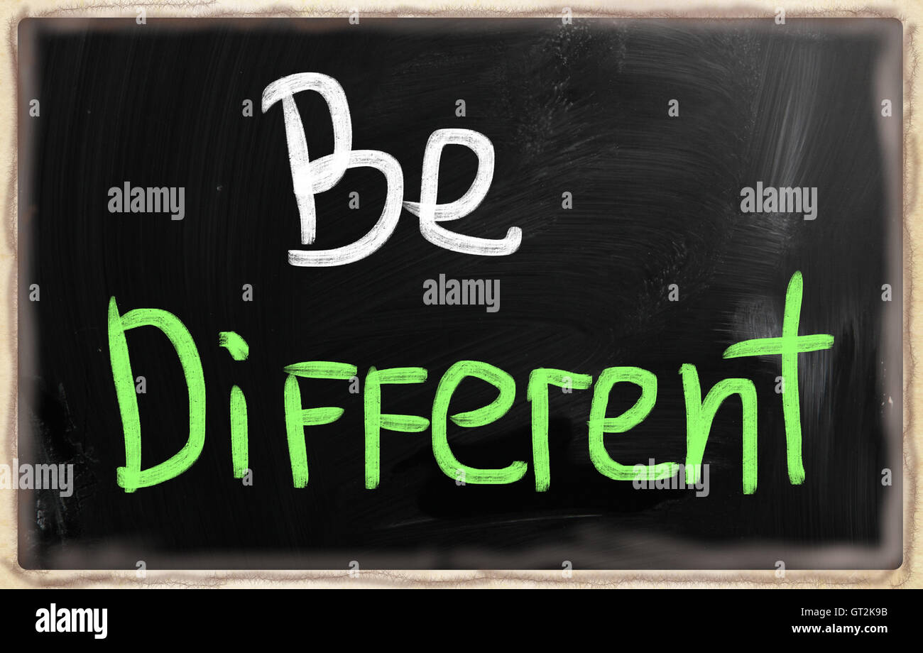 Be different handwritten with chalk on a blackboard Stock Photo