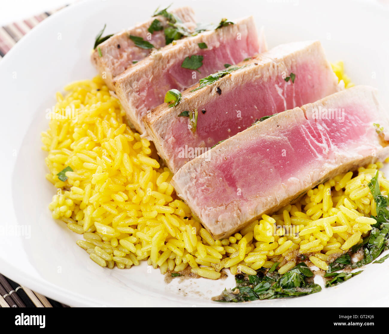 Ahi Tuna Steak With Rice and herbs sauce Stock Photo Alamy