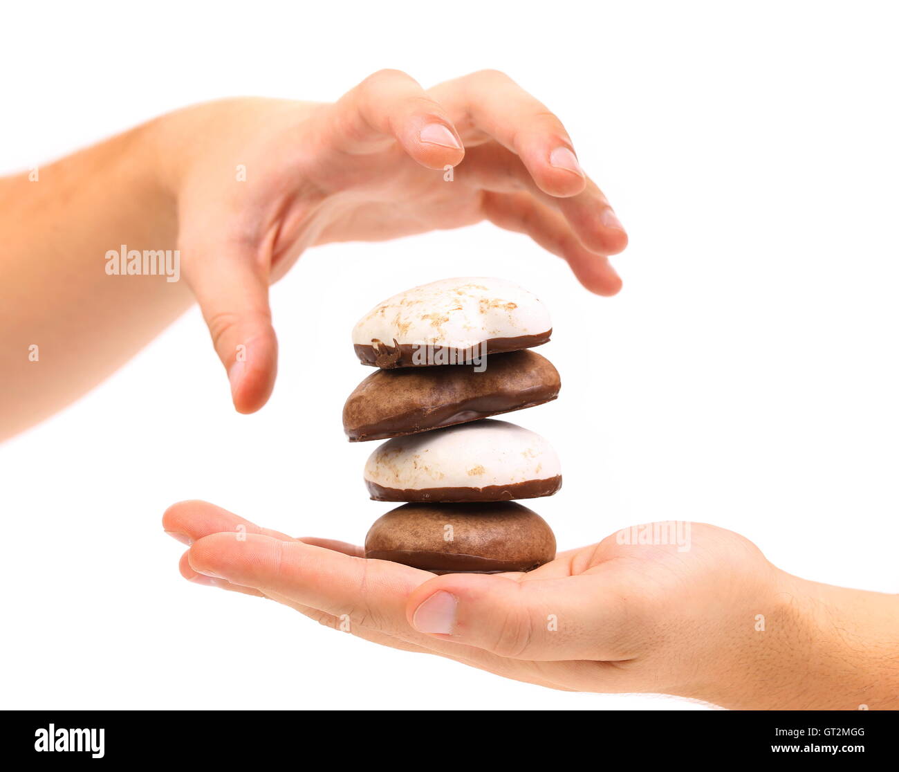 Hand holds stack chocolate hi-res stock photography and images - Alamy