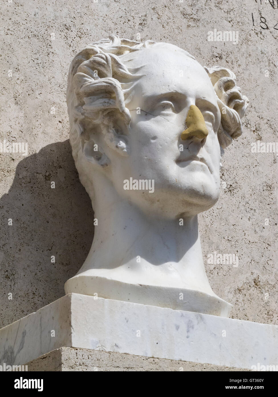 A statue in Rome where the nose has been damaged and replaced. But replaced badly. Stock Photo