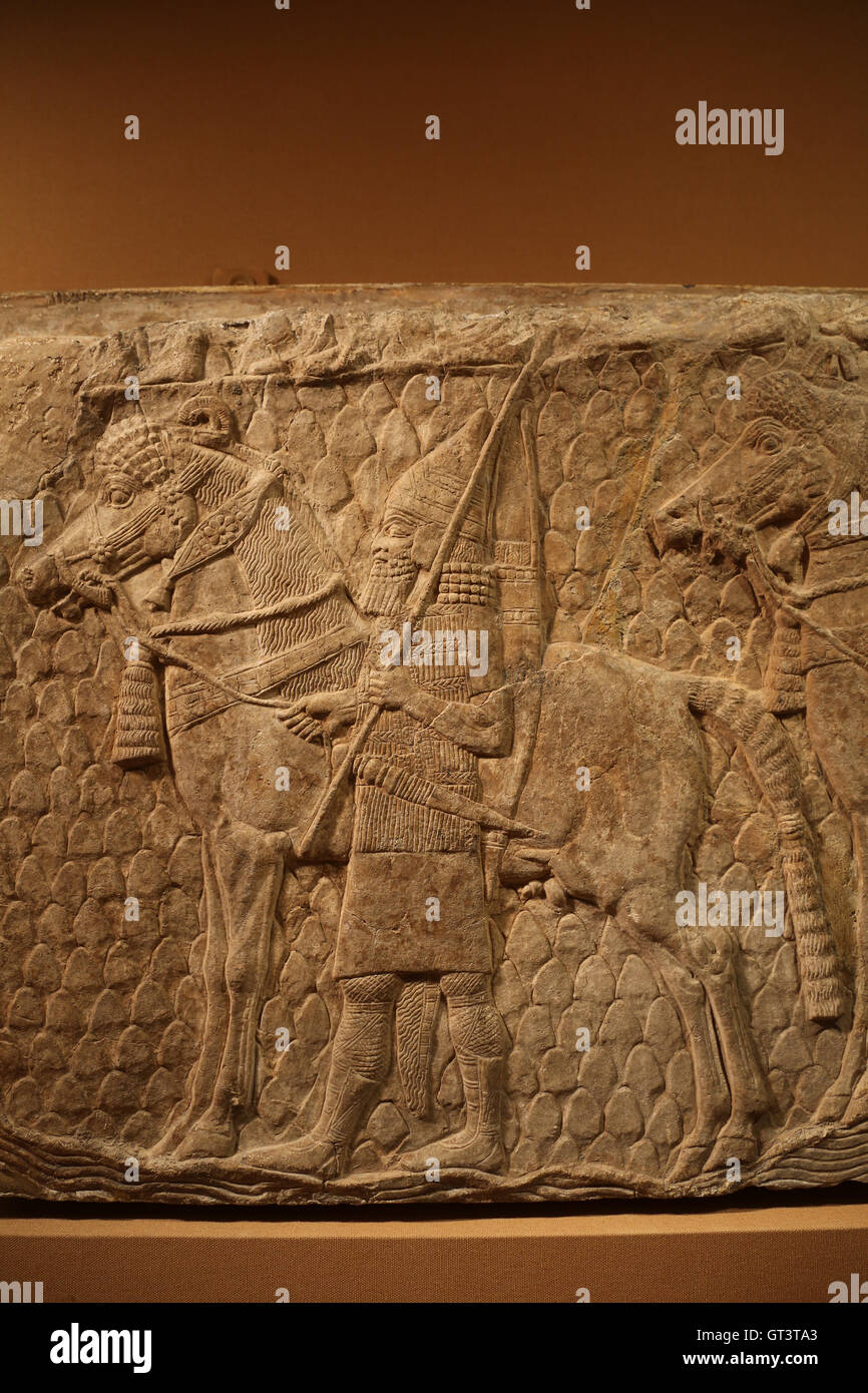 Fragment of relief. Assyrian horse trappings. Cavalrymen. Detail. Ca. 704-681 B.C. Stock Photo