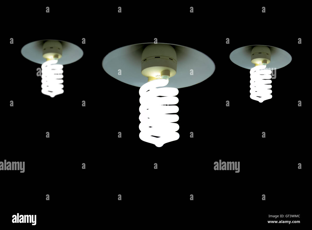 Hanging Light Bulb in the empty black background Stock Photo Alamy