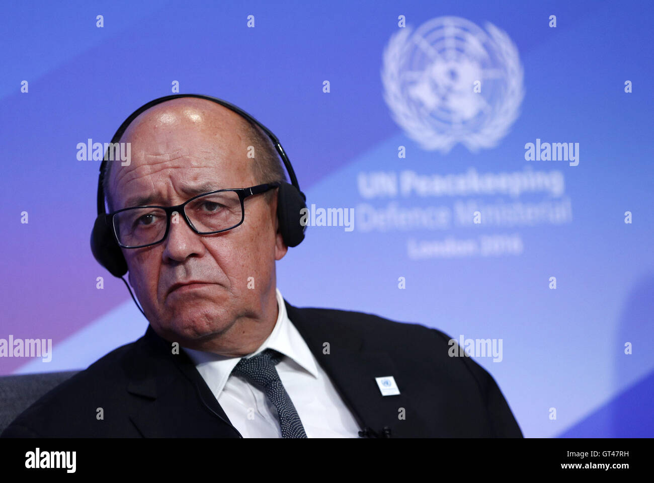 France Defence Minister Jean-Yvres Le Drian listens to comments during Improving Peacekeeping - Rapid Deployment, at the UN Peacekeeping Defence Ministerial at Lancaster House in London. Stock Photo