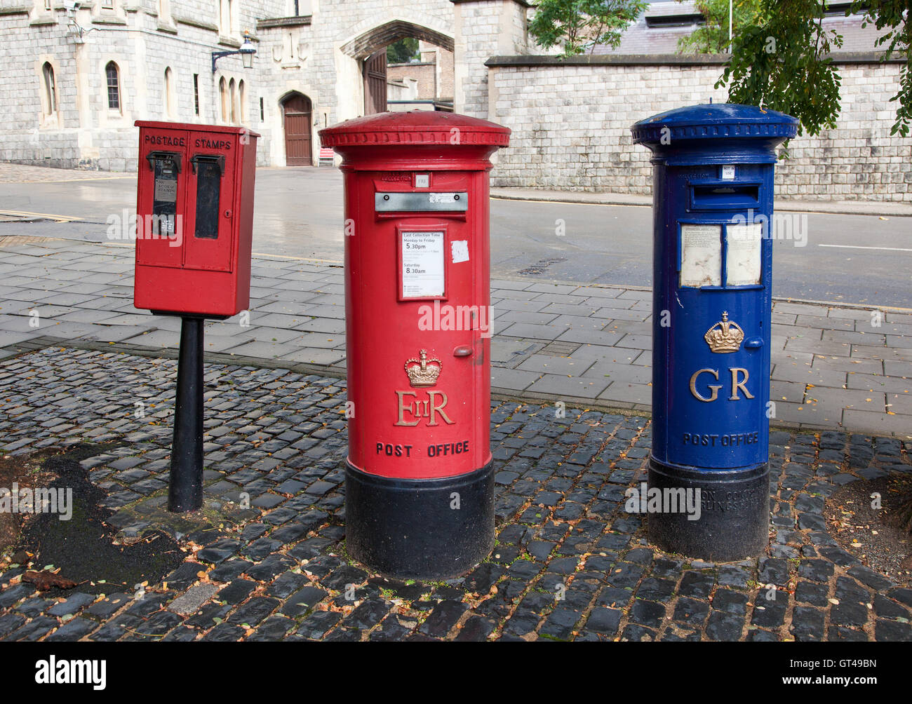 red British mail box on a city street Stock Photo