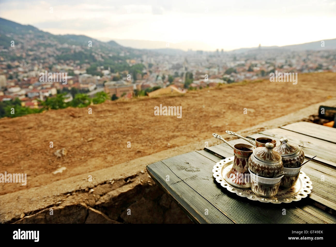 Two cups of bosnian traditional coffee on a wooden table Stock Photo
