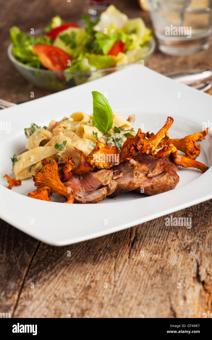 pork fillet with chanterelle mushrooms Stock Photo Alamy