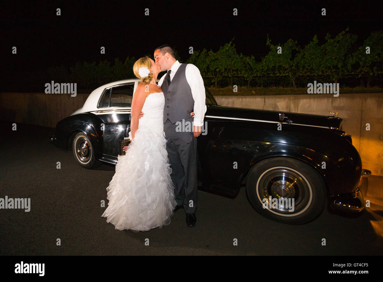 Bride and Groom with Classic Car Stock Photo - Alamy