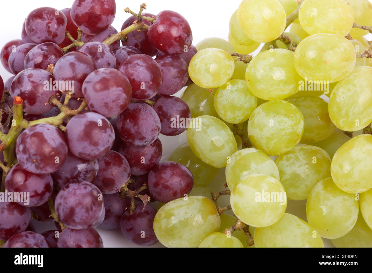 bunch of green and red grapes on a white background Stock Photo