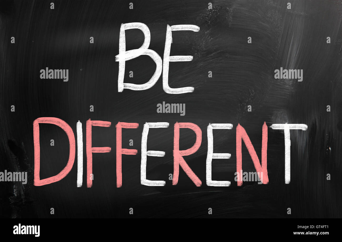 Be different handwritten with chalk on a blackboard Stock Photo