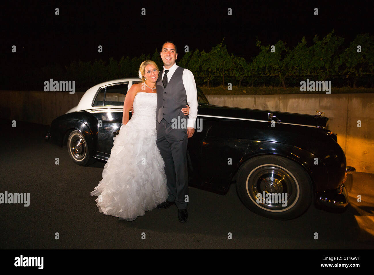Bride and Groom with Classic Car Stock Photo - Alamy
