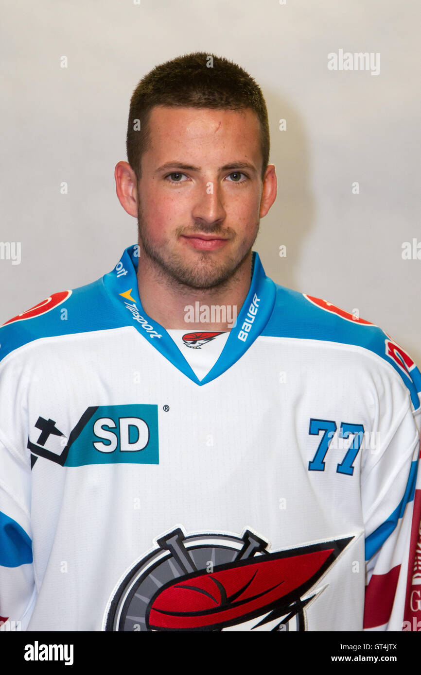 Hockey player of team Pirati Chomutov poses for photographer, Czech