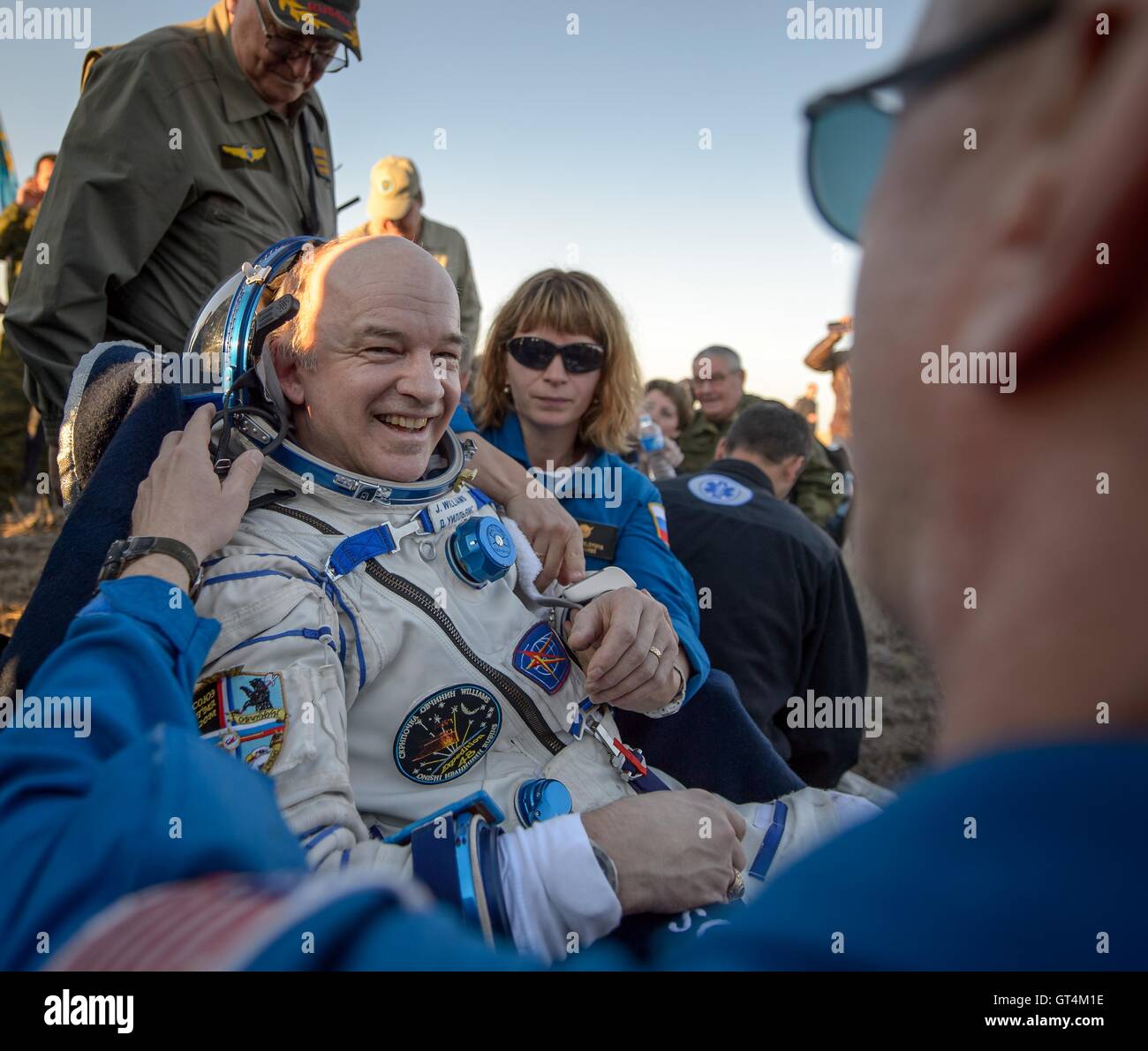 NASA astronaut Jeff Williams rests in a chair outside the Soyuz TMA-20M spacecraft a few moments after he and International Space Station Expedition 48 crew landed September 7, 2016 near Zhezkazgan, Kazakhstan. Stock Photo