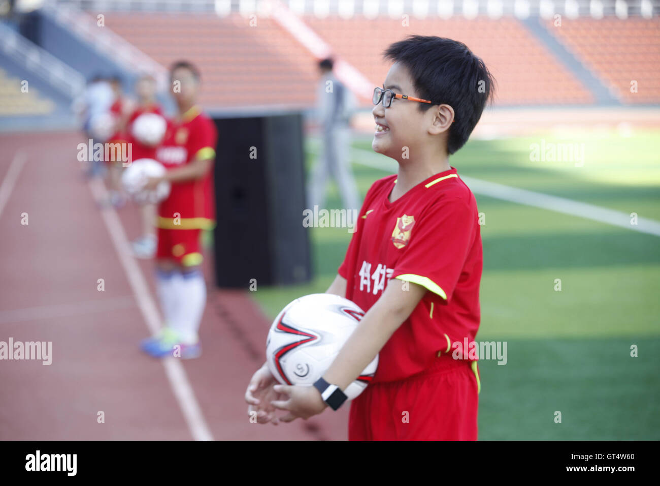 Heihe, Heihe, China. 9th Sep, 2016. Heihe, CHINA-?August 27 2016:?(EDITORIAL?USE?ONLY.?CHINA?OUT) A ball boy at the Sino-Russian football match. A Sino-Russian football match is held in Heihe, northeast ChinaÂ¡Â¯s Heilongjang Province. Dozens of Chinese ball boys take the responsibility of picking up football during the match. © SIPA Asia/ZUMA Wire/Alamy Live News Stock Photo