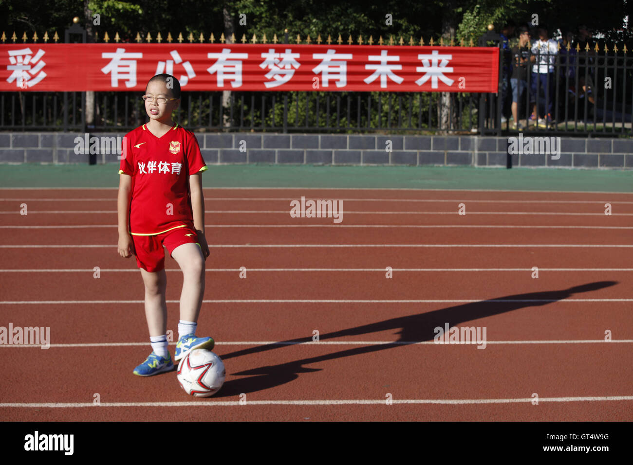 Heihe, Heihe, China. 9th Sep, 2016. Heihe, CHINA-?August 27 2016:?(EDITORIAL?USE?ONLY.?CHINA?OUT) A ball boy at the Sino-Russian football match. A Sino-Russian football match is held in Heihe, northeast ChinaÂ¡Â¯s Heilongjang Province. Dozens of Chinese ball boys take the responsibility of picking up football during the match. © SIPA Asia/ZUMA Wire/Alamy Live News Stock Photo