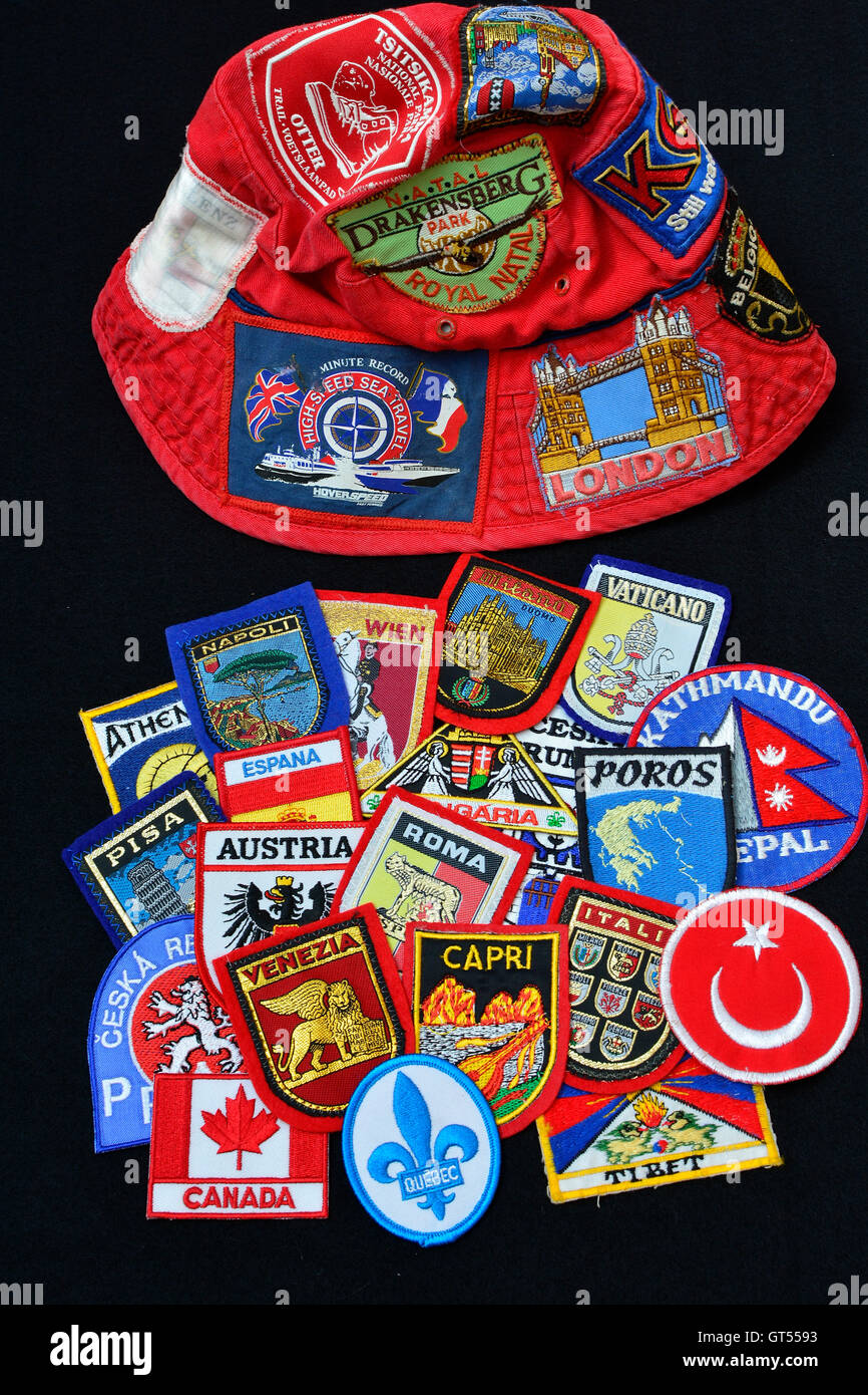 Get your travel hat on. International travel concept. Travel badges from countries and cities. Tourism. International tourism. Stock Photo