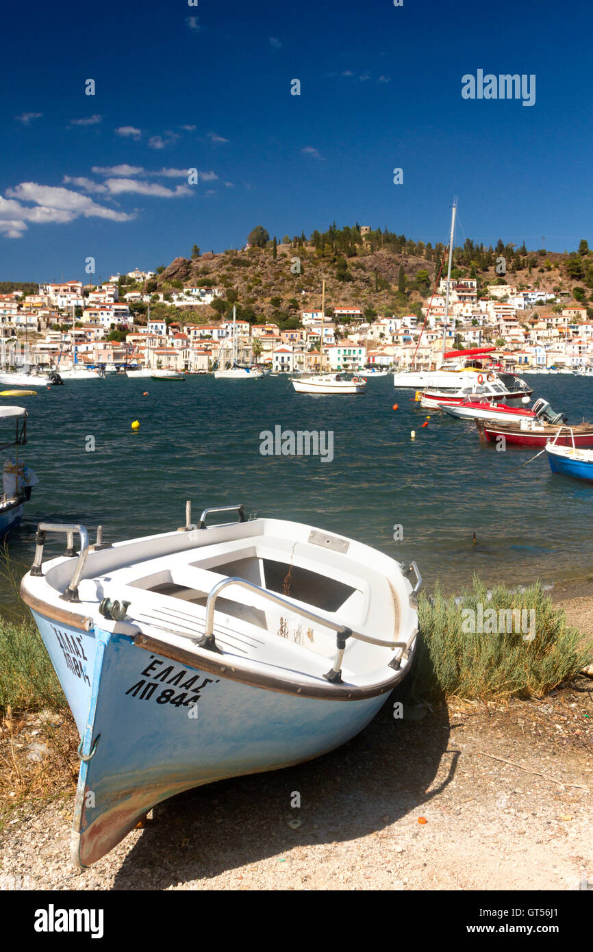 Fishing boat at Galatas town, at the island of Poros at the background, Greece. Stock Photo
