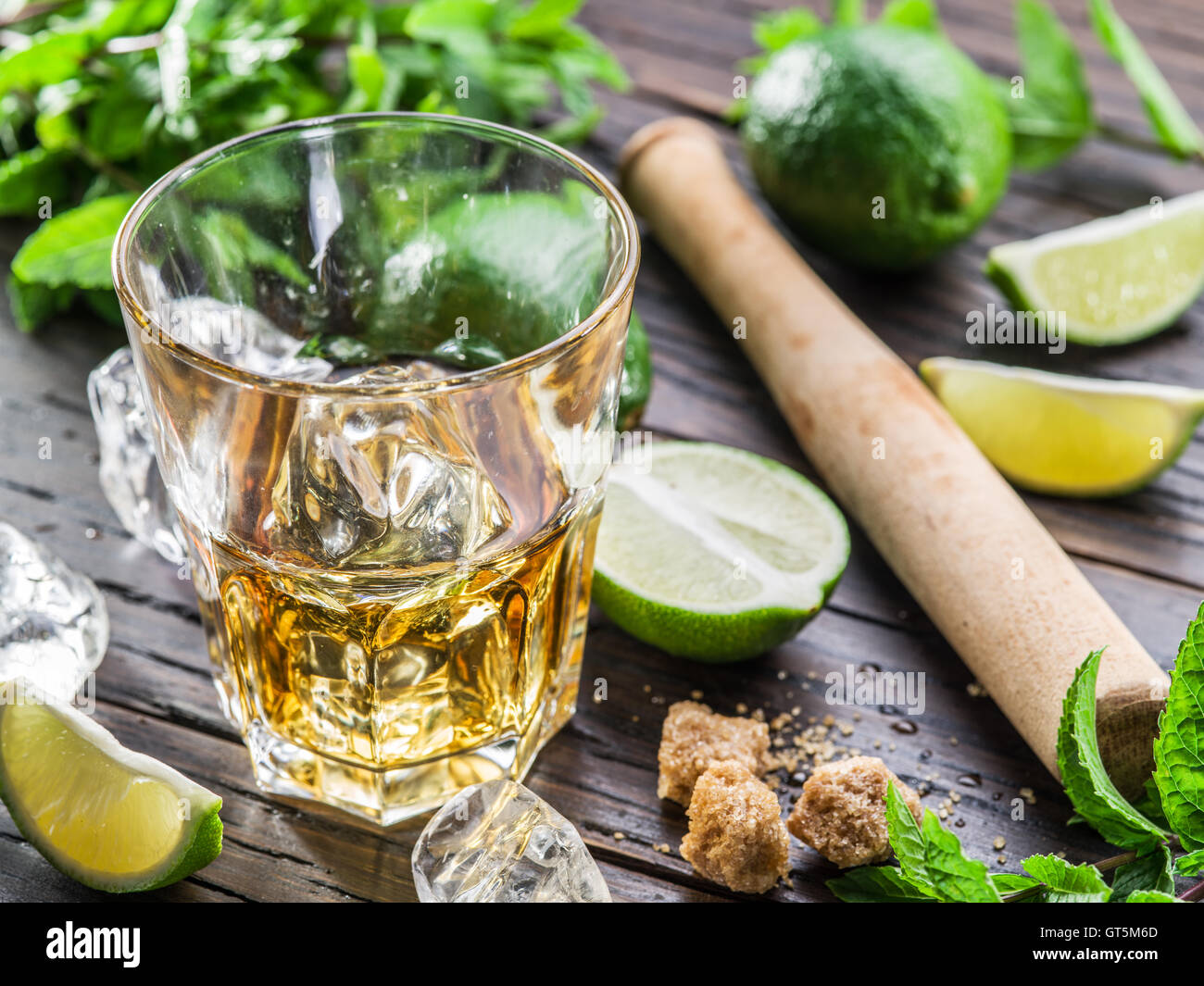 Mojito cocktail ingredients on the wooden table. Stock Photo