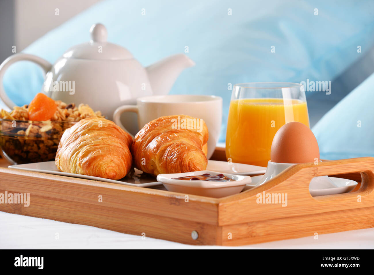 Breakfast on tray in bed in hotel room Stock Photo - Alamy