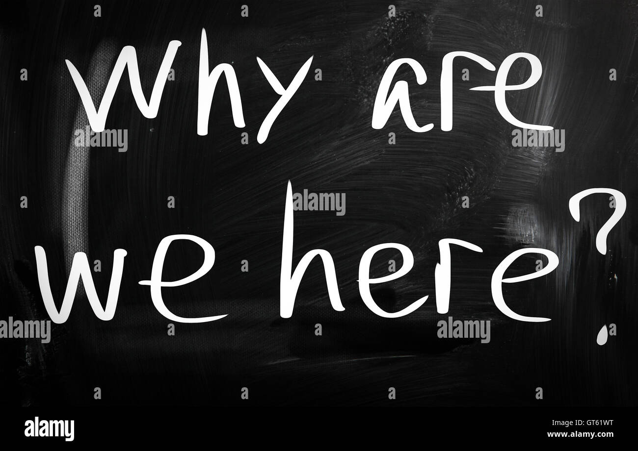 why are we here handwritten with white chalk on a blackboard Stock Photo