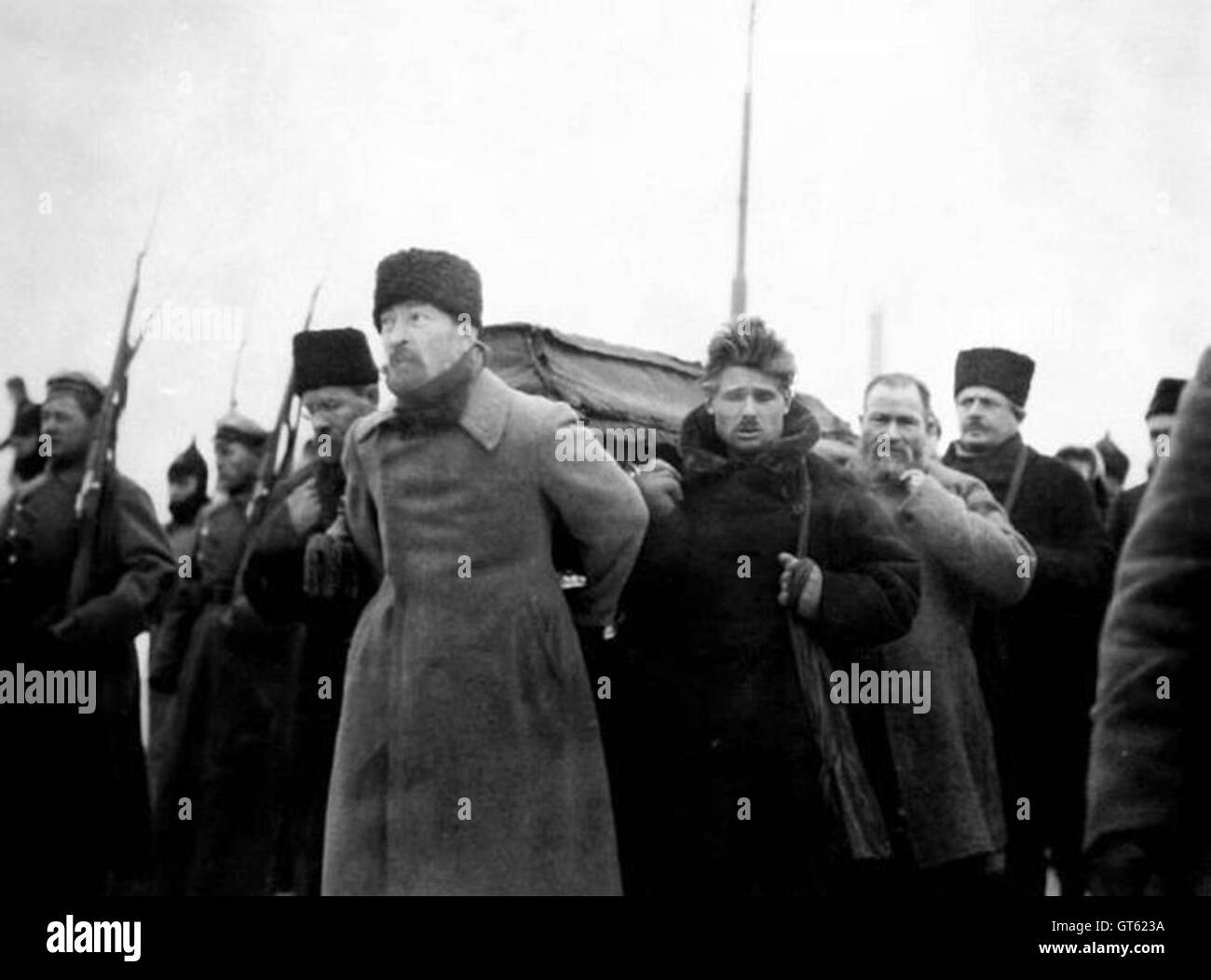 Pallbearers Carrying Lenin's Coffin during his funeral, from Paveletsky Station to the Labor Temple. Felix Dzierżyński at the front with Timofei Sapronov behind him and Lev Kamenev at left. Stock Photo