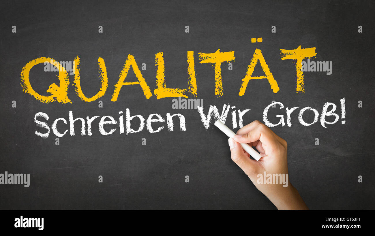 Quality Slogan (In German Stock Photo - Alamy