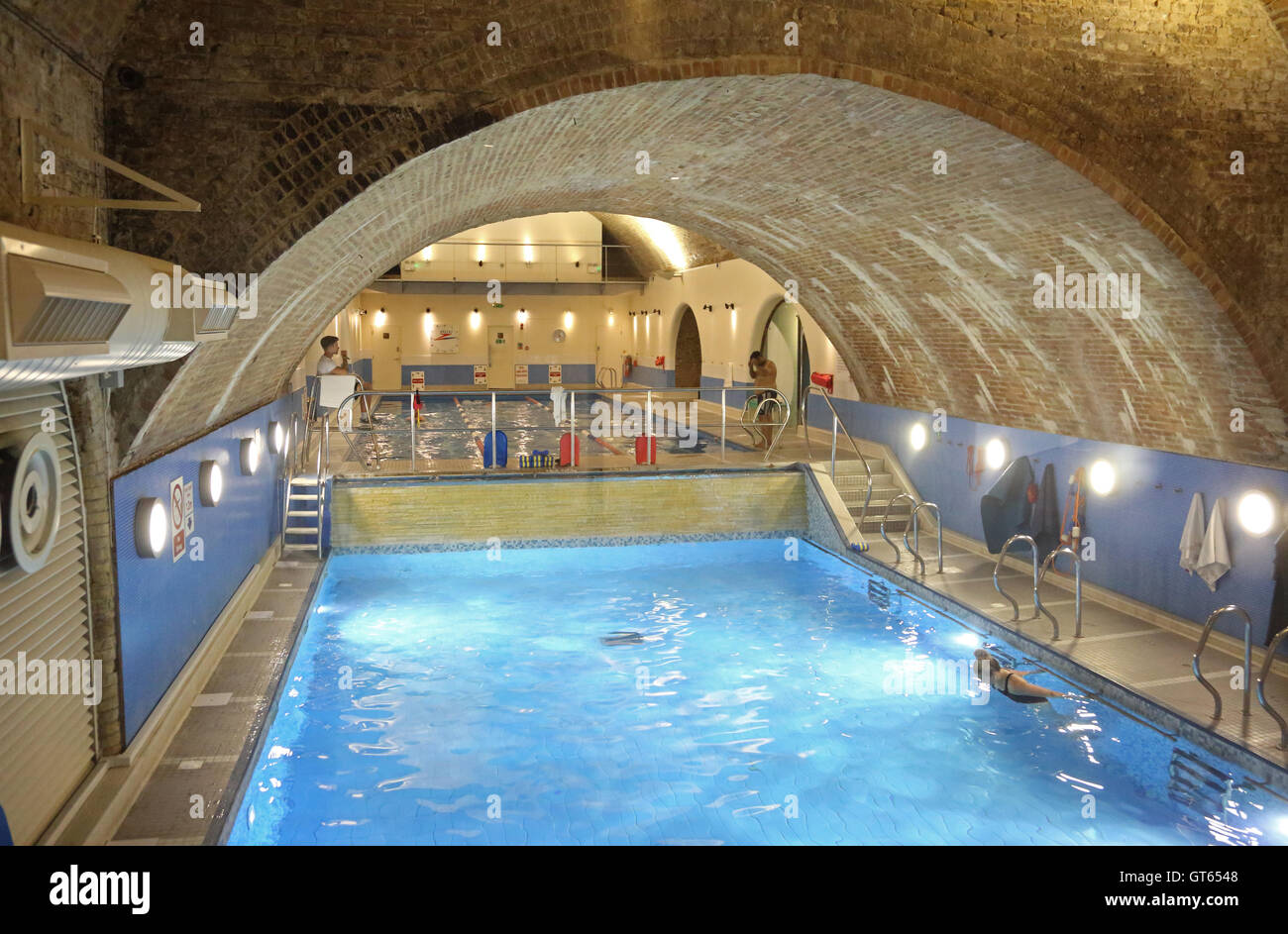 Swimming pool in the Nuffield Fitness Centre located in Victorian railway arches beneath London's Cannon Street Station Stock Photo
