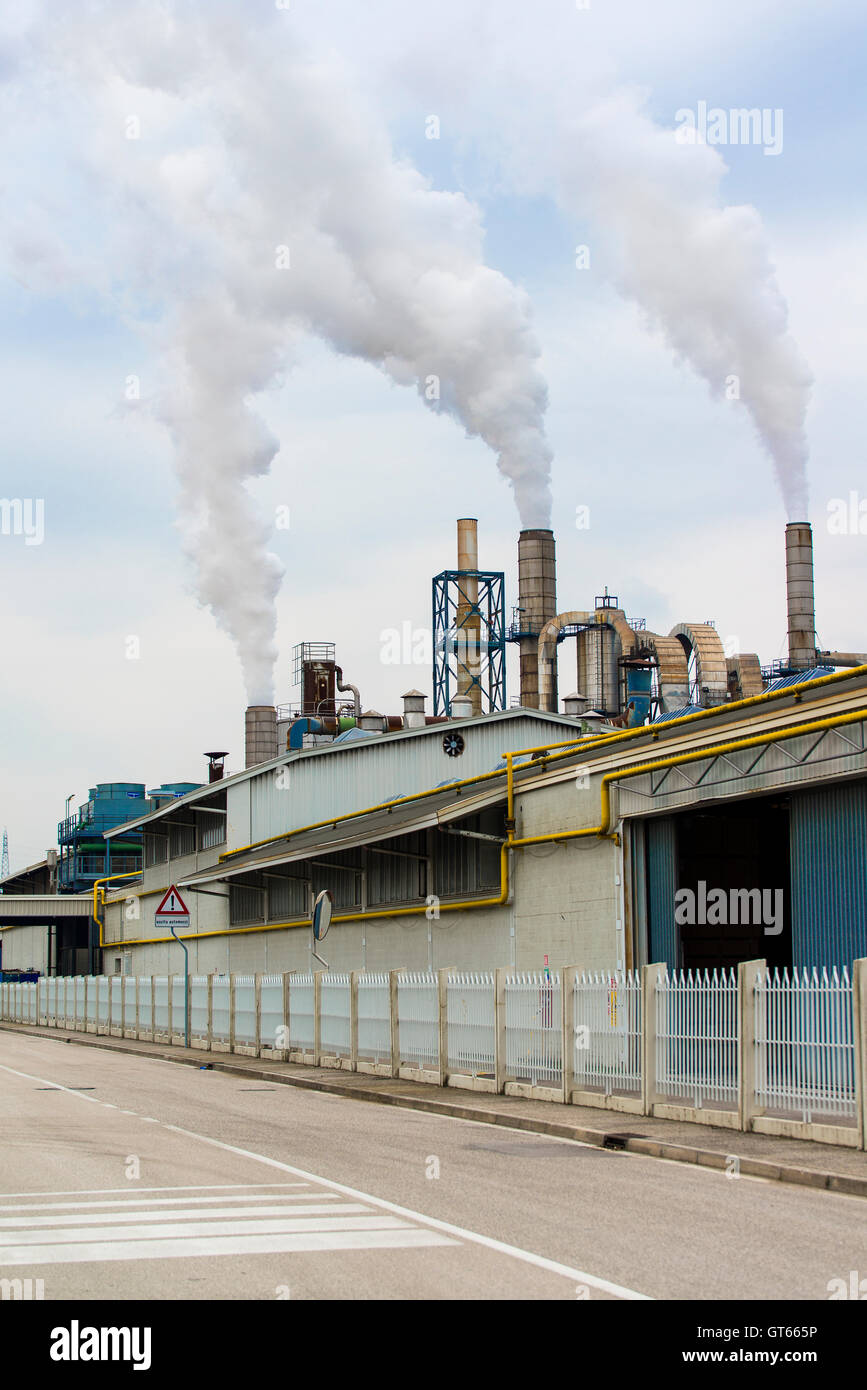 environment pollution smoke factory chimney industry sky air steam smog energy power industrial plant global warming chemical  Stock Photo