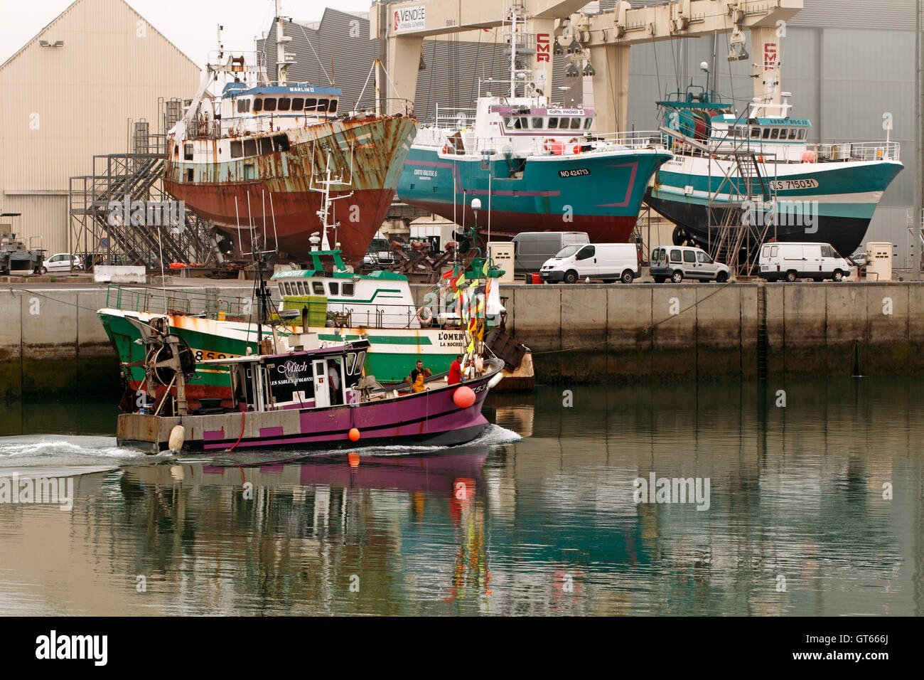 small fishing boat trawler coming in with catch, Sables d'Olonne France Stock Photo