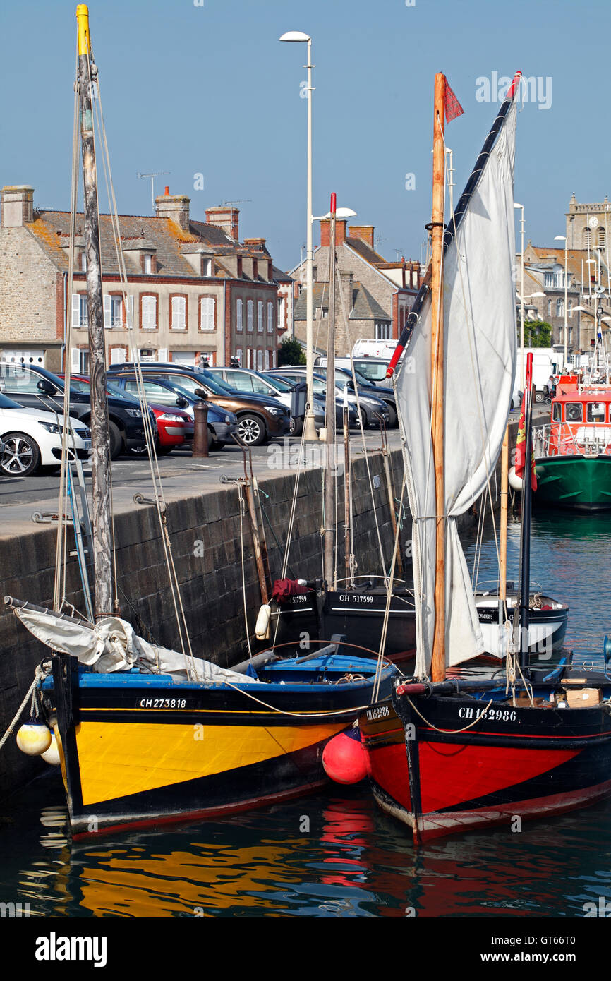 Traditional sailing fishing boats at Barfleur Normandy, France. Stock Photo