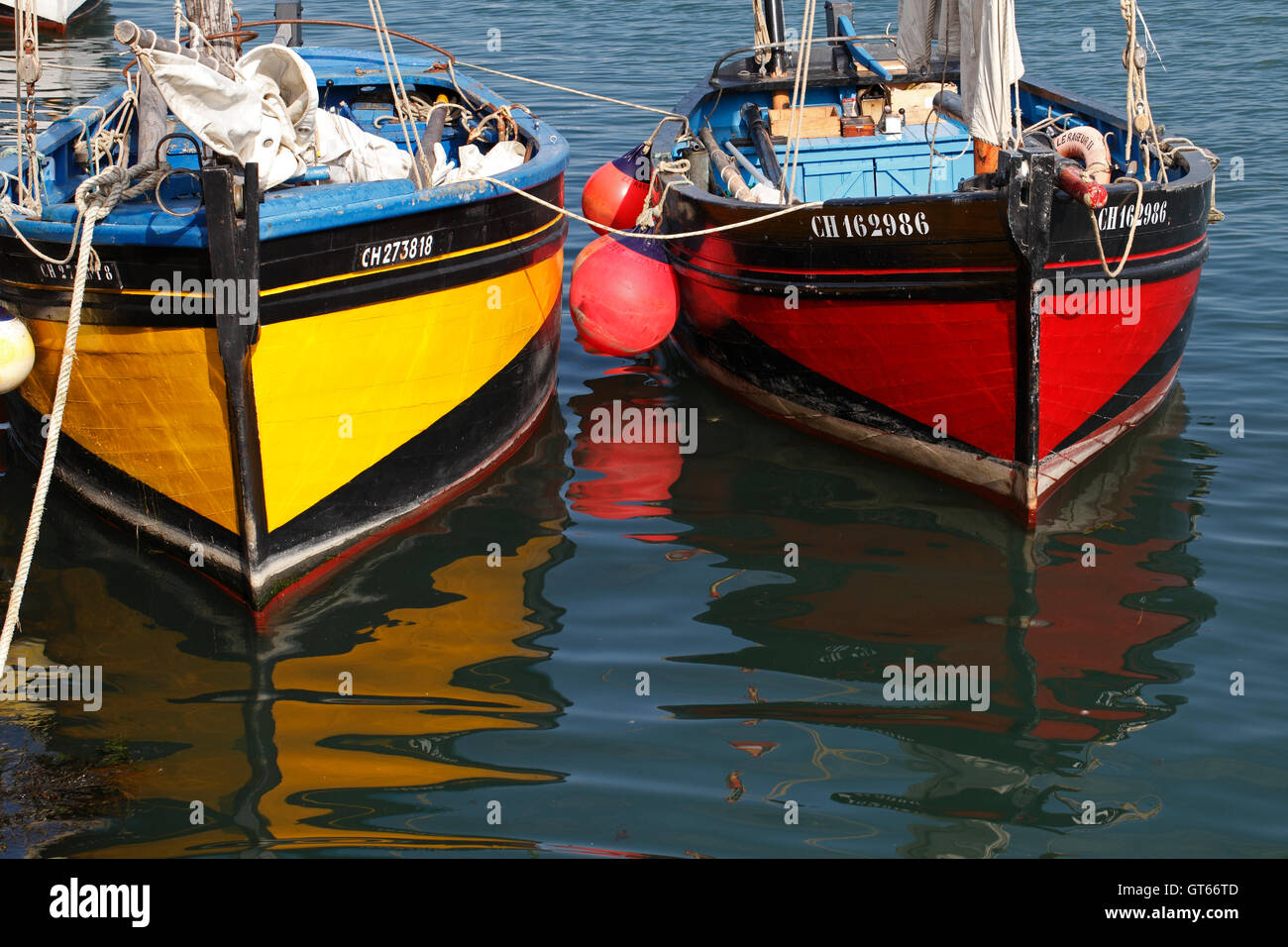 Traditional sailing fishing boats at Barfleur Normandy, France. Stock Photo