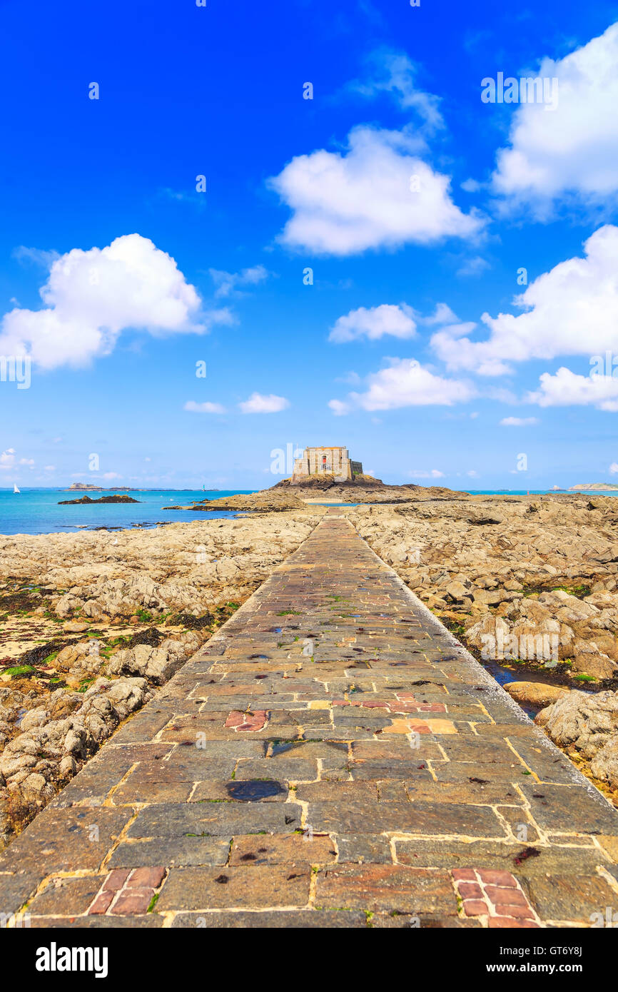 Saint Malo, Petit Be Fort and stone pathway during Low Tide. Brittany, France, Europe. Stock Photo