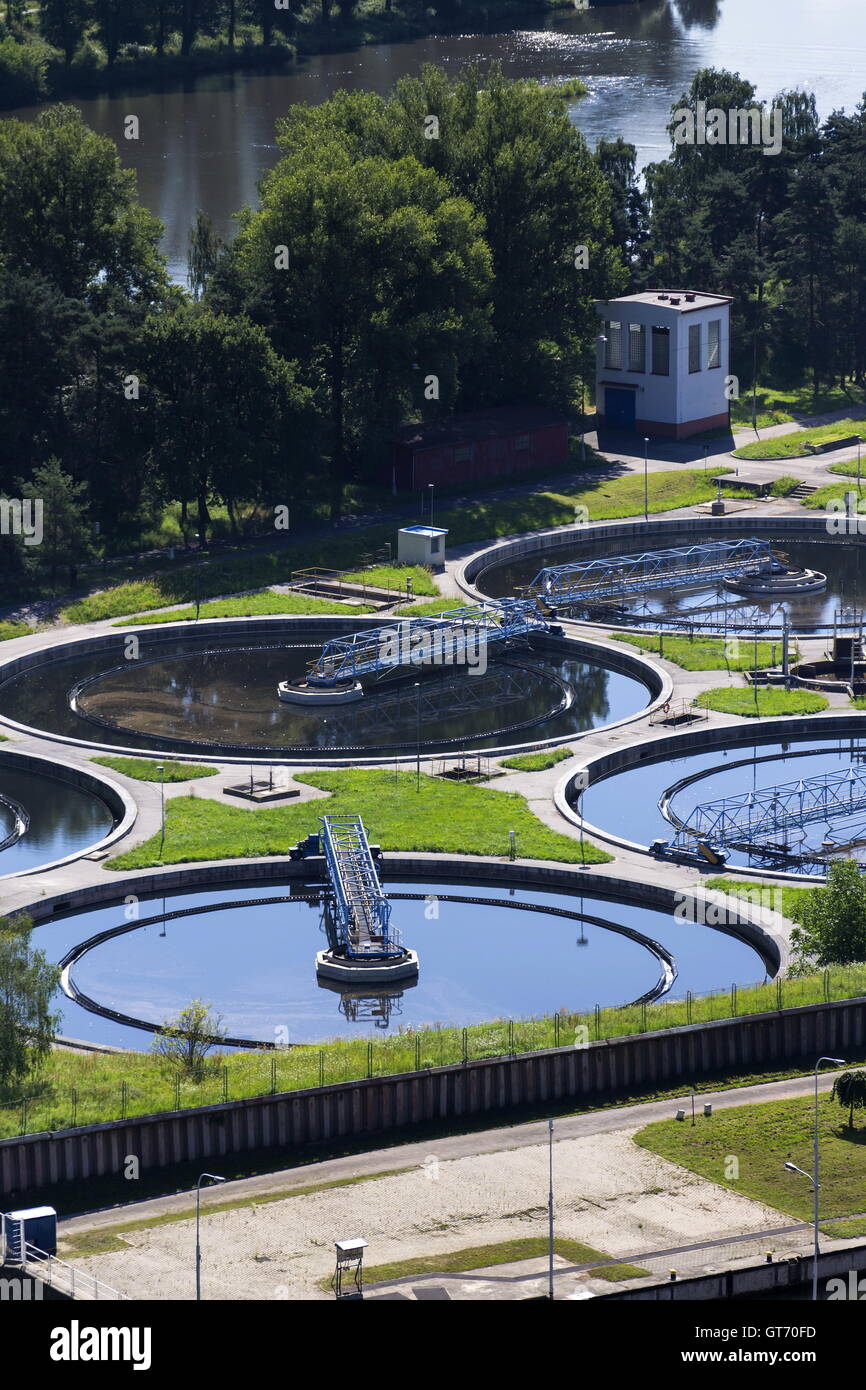 Sewage water treatment plant with river Stock Photo