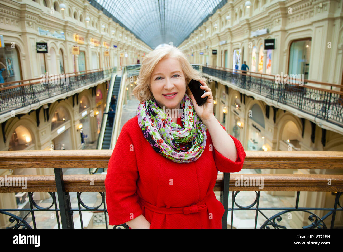 Happy mature woman calling hi-res stock photography and images - Alamy