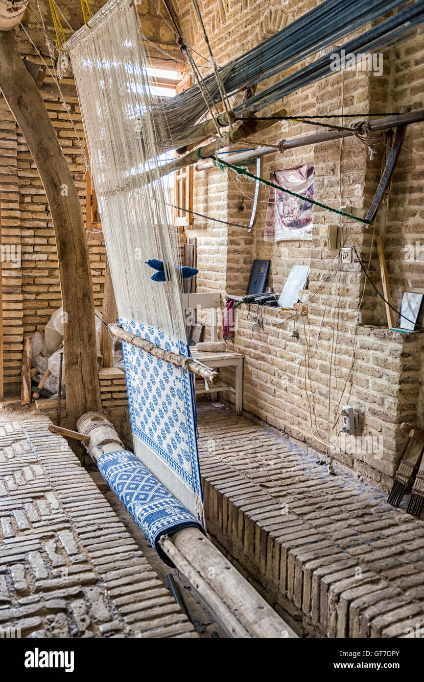 An ancient loom used to weave traditional twosided rugs of Meybod