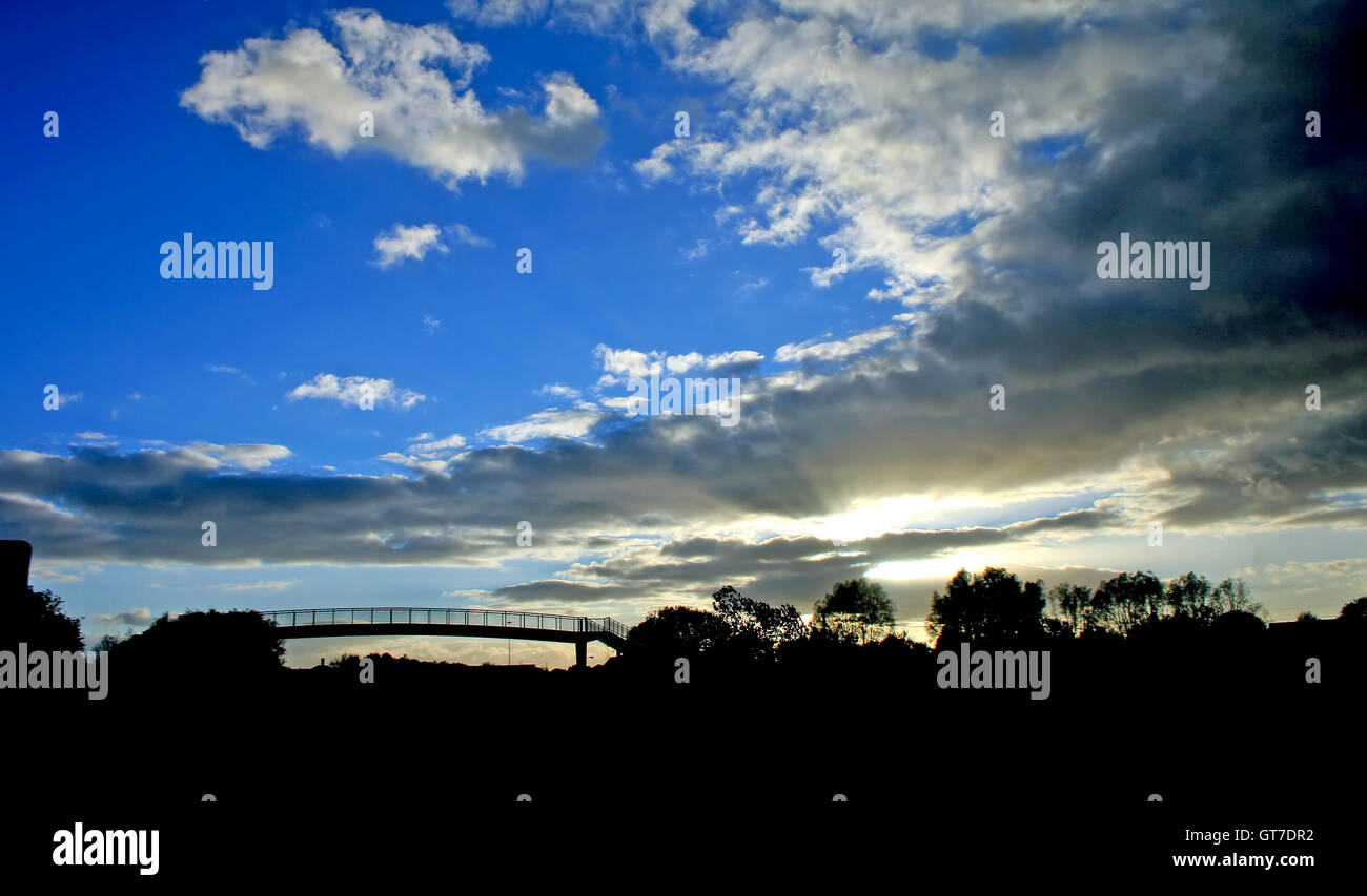 A silhouette of a bridge in sunset Stock Photo - Alamy