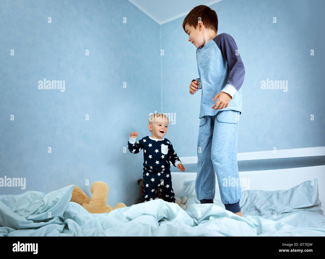 children jumping on the bed Stock Photo Alamy
