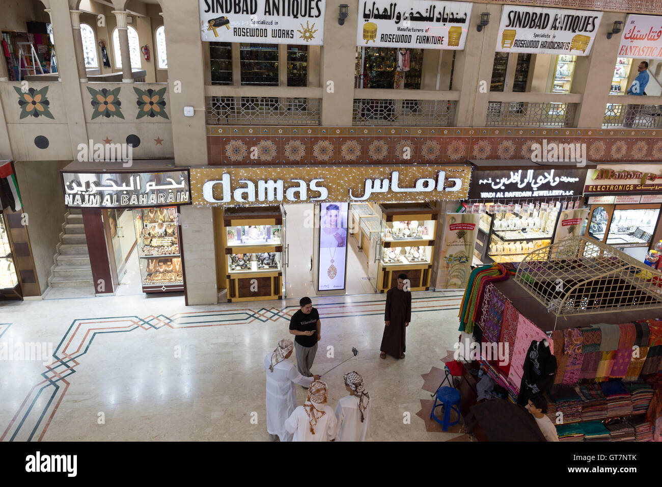 Customers taking a selfie inside The Central Souk, Sharjah, UAE Stock Photo