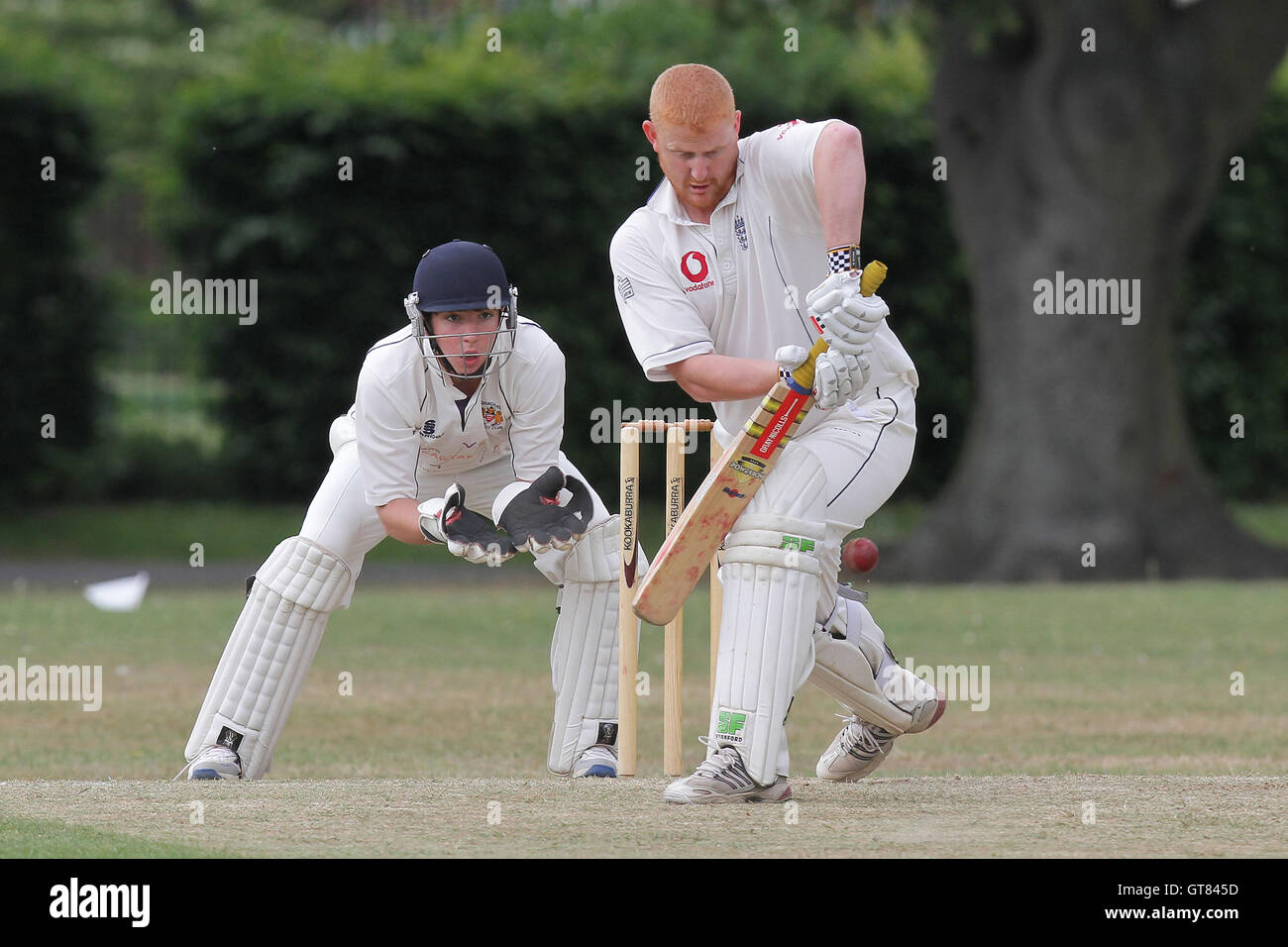 M Embery in batting action for Goodmayes - Goodmayes & Blythswood CC (fielding) vs Hornchurch Athletic CC 2nd XI - Essex Club Cricket at Goodmayes Park - 14/05/11 Stock Photo