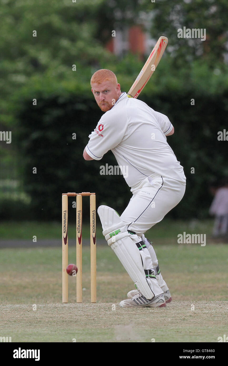 M Embery in batting action for Goodmayes - Goodmayes & Blythswood CC (fielding) vs Hornchurch Athletic CC 2nd XI - Essex Club Cricket at Goodmayes Park - 14/05/11 Stock Photo