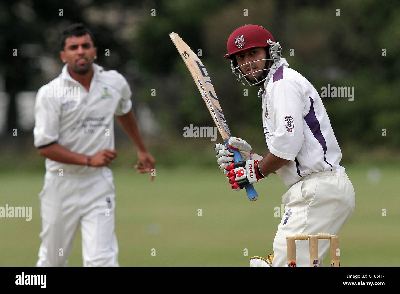 Atif Zafar of Hainault looks back as he is caught behind from the bowling of Zain Shahzad - Hainault & Clayhall CC (batting) vs Wanstead CC - Essex Cricket League - 09/07/11 - contact@tgsphoto.co.uk Stock Photo