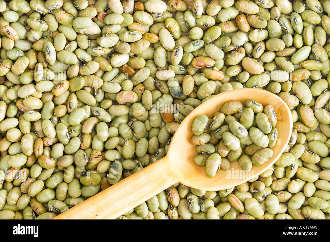 Background food texture of dried edamame, or green soya beans, with a