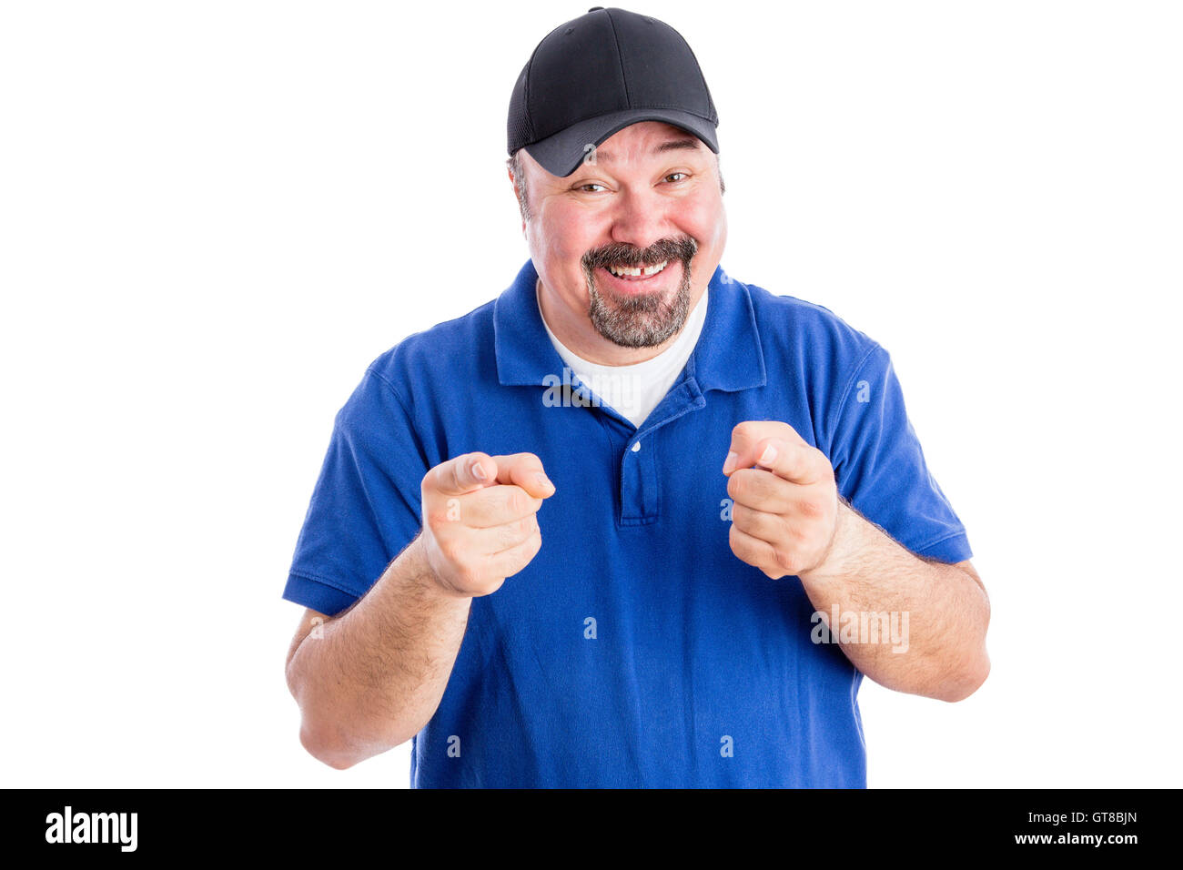 Gleeful happy middle aged man in casual clothes pointing at the camera with a playful amused expression, isolated on white Stock Photo