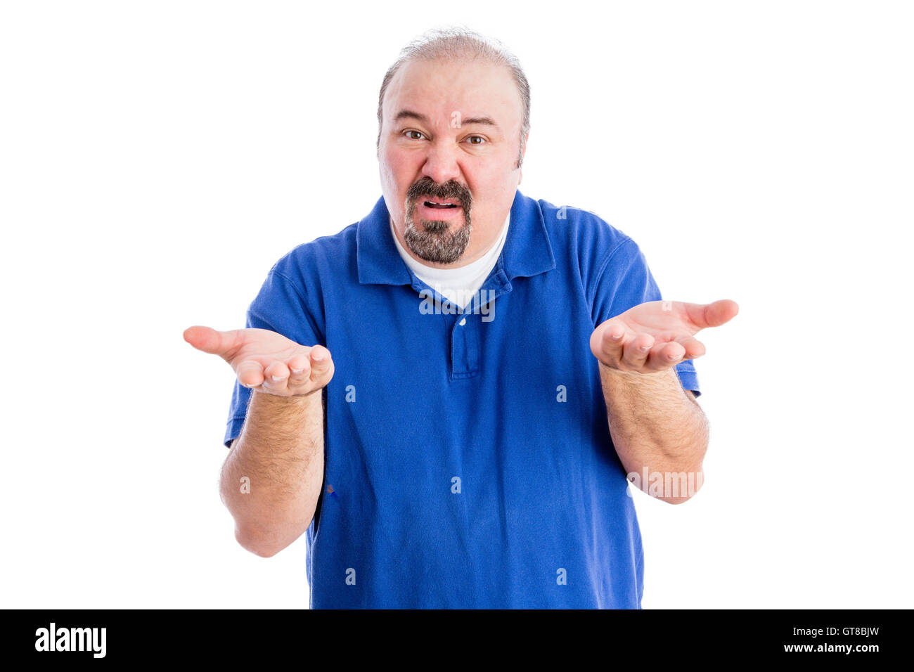 Middle-aged derisive man shrugging his shoulders and gesticulating as he shows his ignorance and disdain, isolated on white Stock Photo