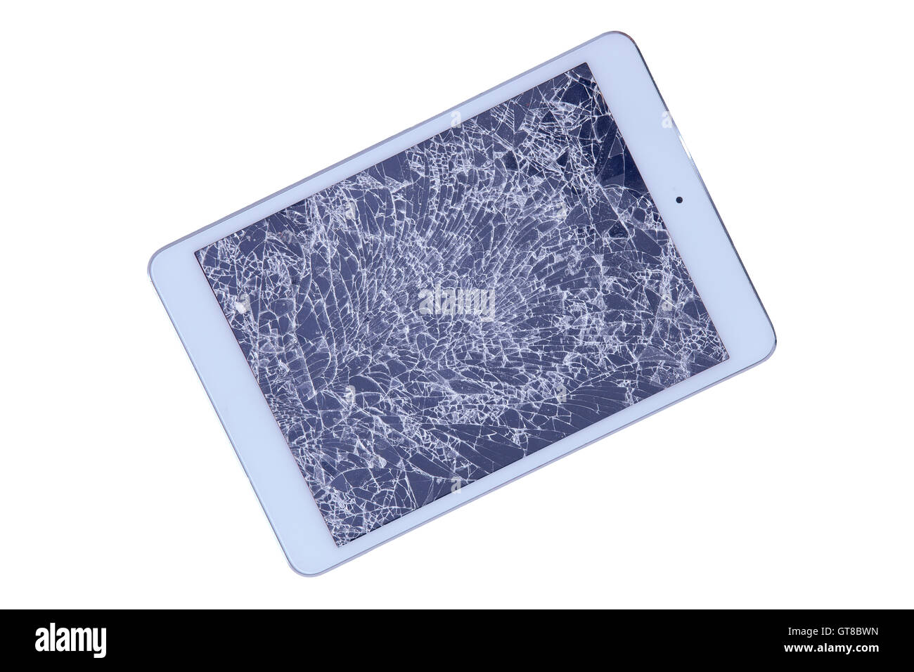 Tablet with a shattered glass screen rendered unusable after an accident or fall viewed isolated on white from above, diagonal w Stock Photo