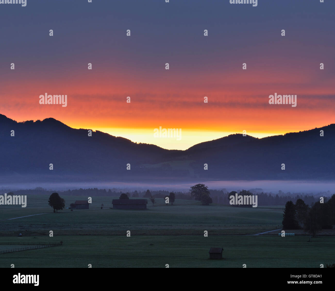 Mountains and Valley at Dawn, Loisachwinkel, Kocheler Moos, Murnau, Upper Bavaria, Bavaria, Germany Stock Photo