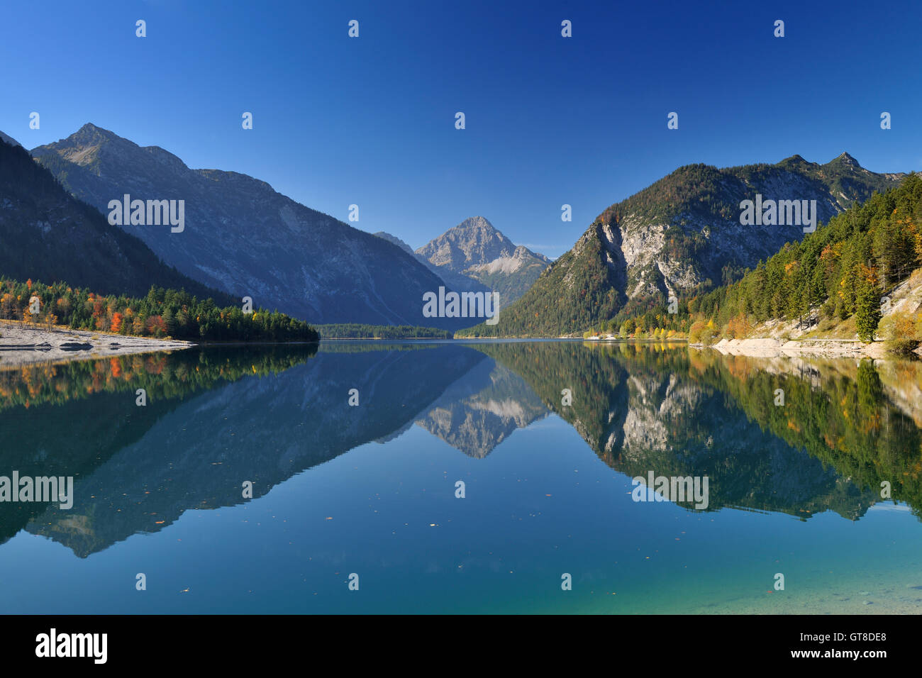 Reflection of Mountains in Lake, Plansee, Tyrol, Austria Stock Photo ...