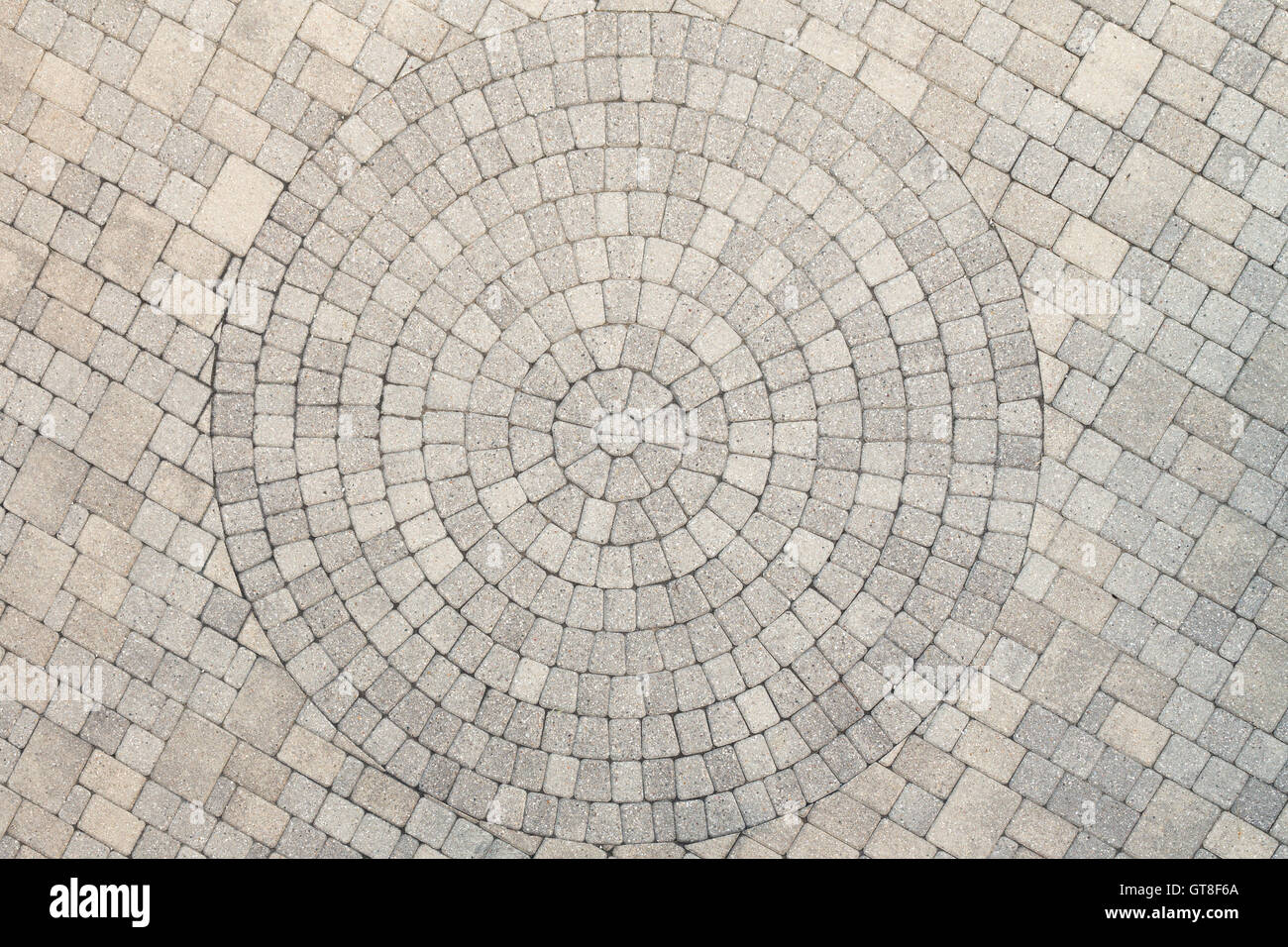Center view of patio pavers circle design overhead view. Showing well
