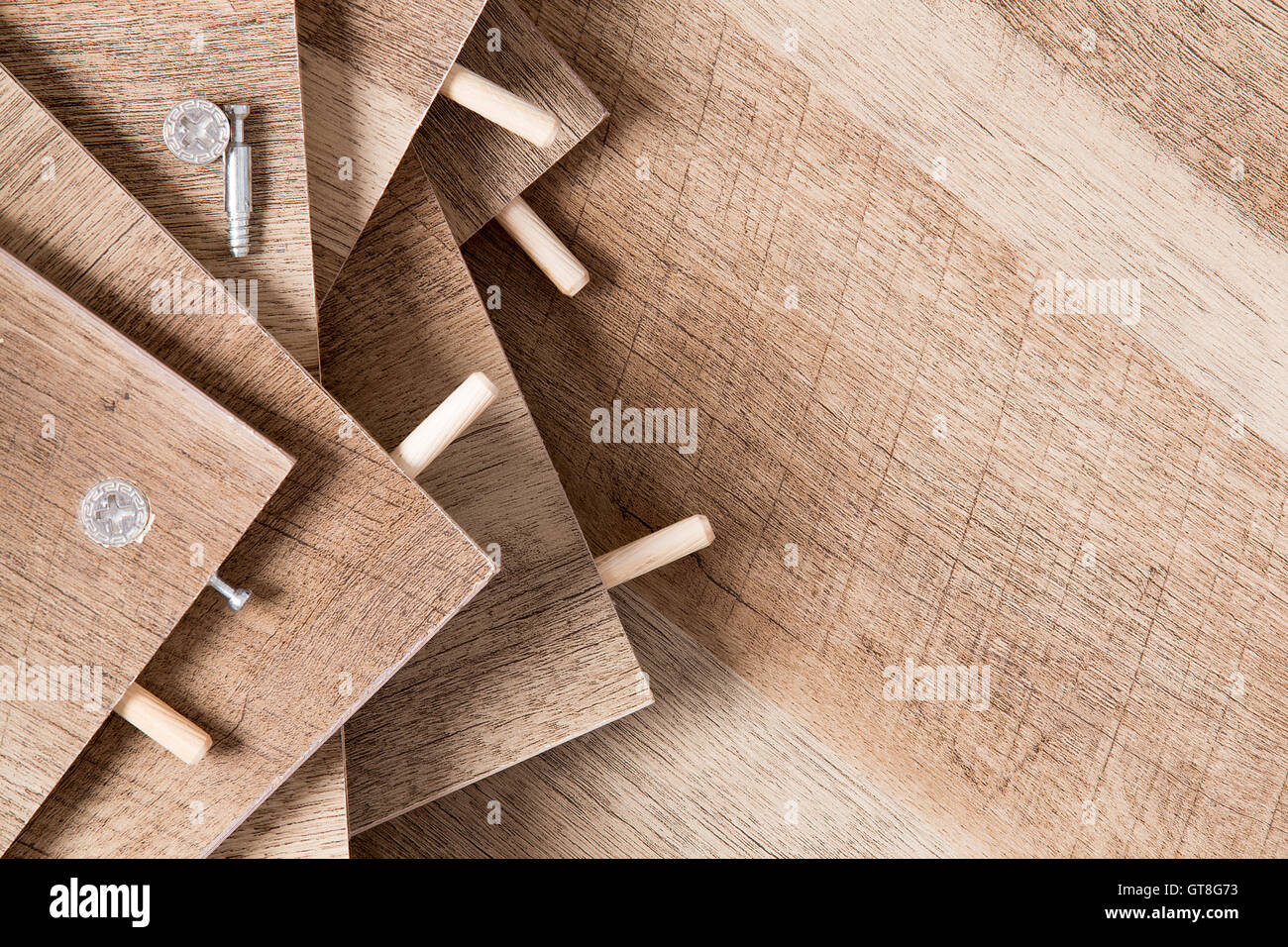 High Angle Close Up of Unfinished Wood Planks with Pegs and Holes
